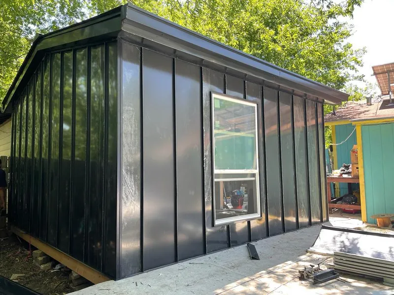 Black standing seam metal wall panels for Roof Inspection in Crystal Lake