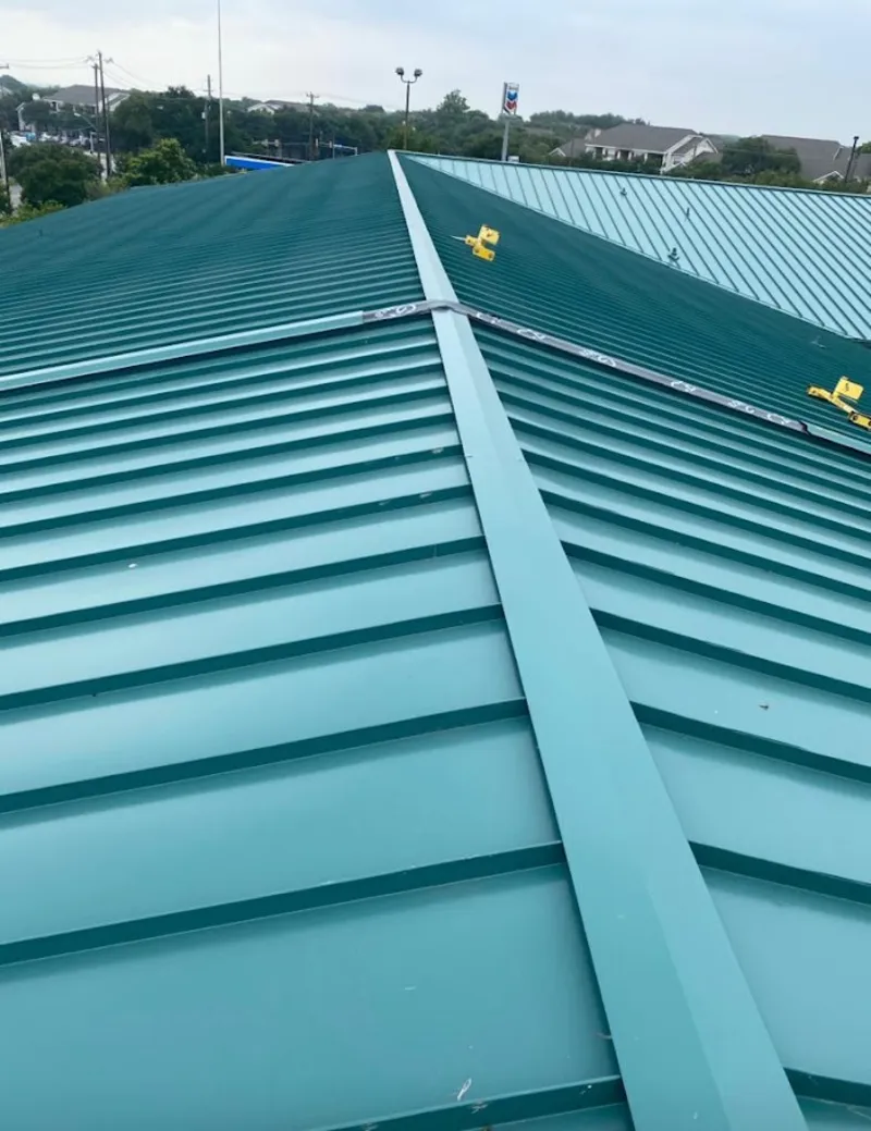 Green commercial metal roof ridge and valley for Metal Roof Repair in Crystal Lake